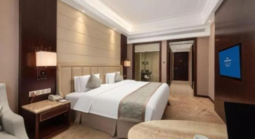 Bed in Howard Johnson Zunyue Hotel Chengdu