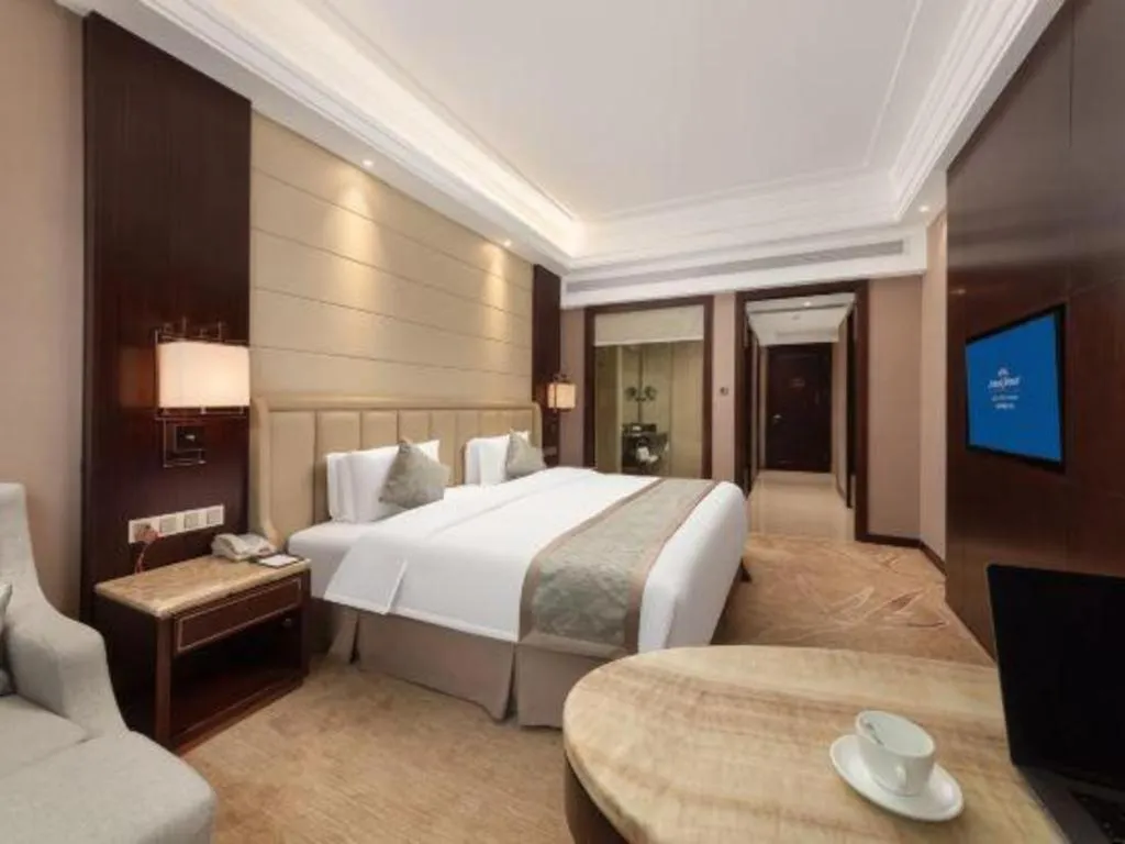 Bed in Howard Johnson Zunyue Hotel Chengdu