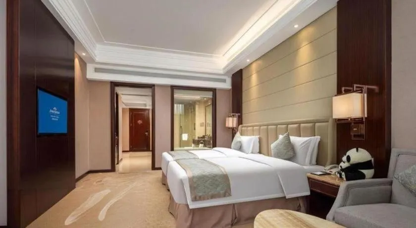 Bed in Howard Johnson Zunyue Hotel Chengdu