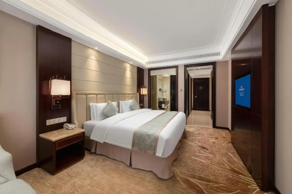 Bed in Howard Johnson Zunyue Hotel Chengdu