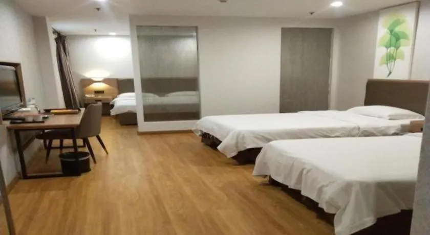 Bed in GreenTree Inn Jining Yanzhou Jiuzhou Fangyuan Business Hotel