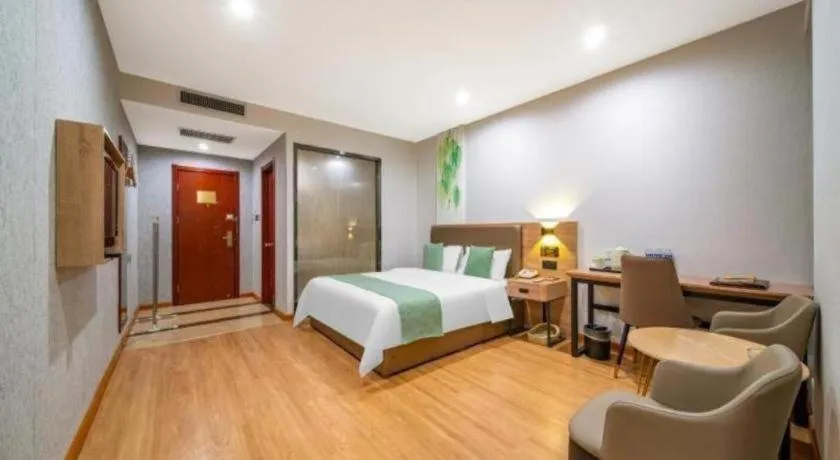 Bed in GreenTree Inn Jining Yanzhou Jiuzhou Fangyuan Business Hotel