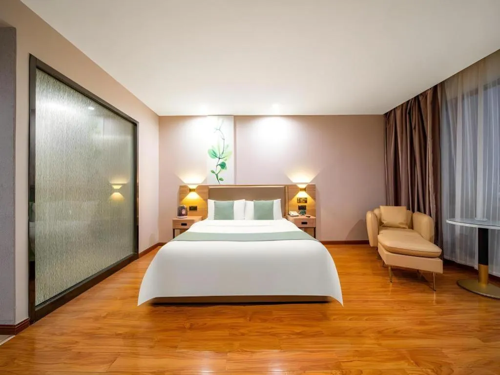 Bed in GreenTree Inn Jining Yanzhou Jiuzhou Fangyuan Business Hotel