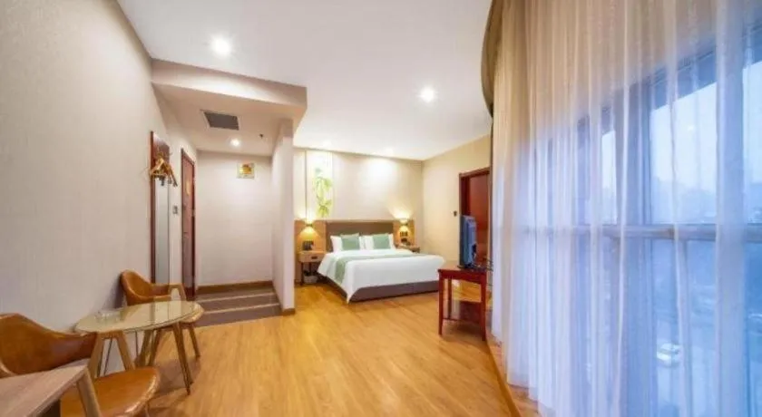 Bed in GreenTree Inn Jining Yanzhou Jiuzhou Fangyuan Business Hotel