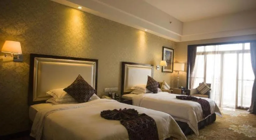 Bed in Country Garden Phoenix Hotel Maoming