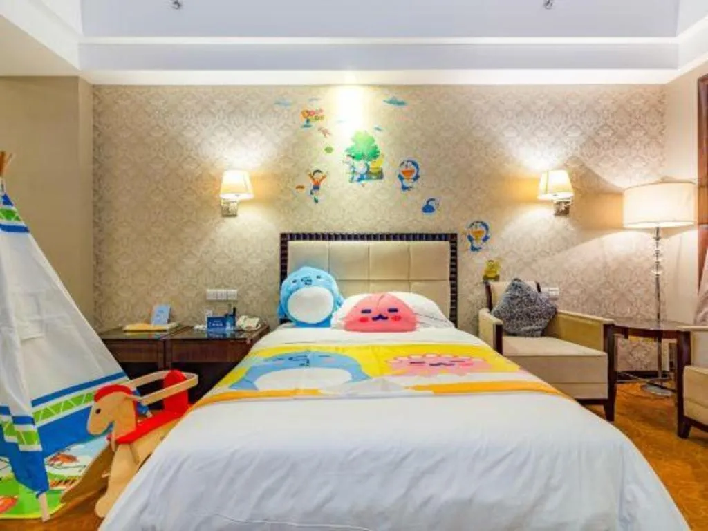 Bed in Country Garden Phoenix Hotel Maoming