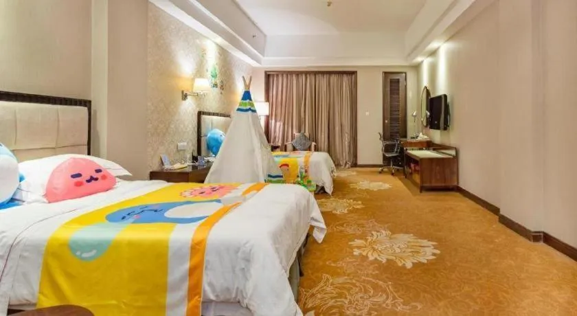 Bed in Country Garden Phoenix Hotel Maoming