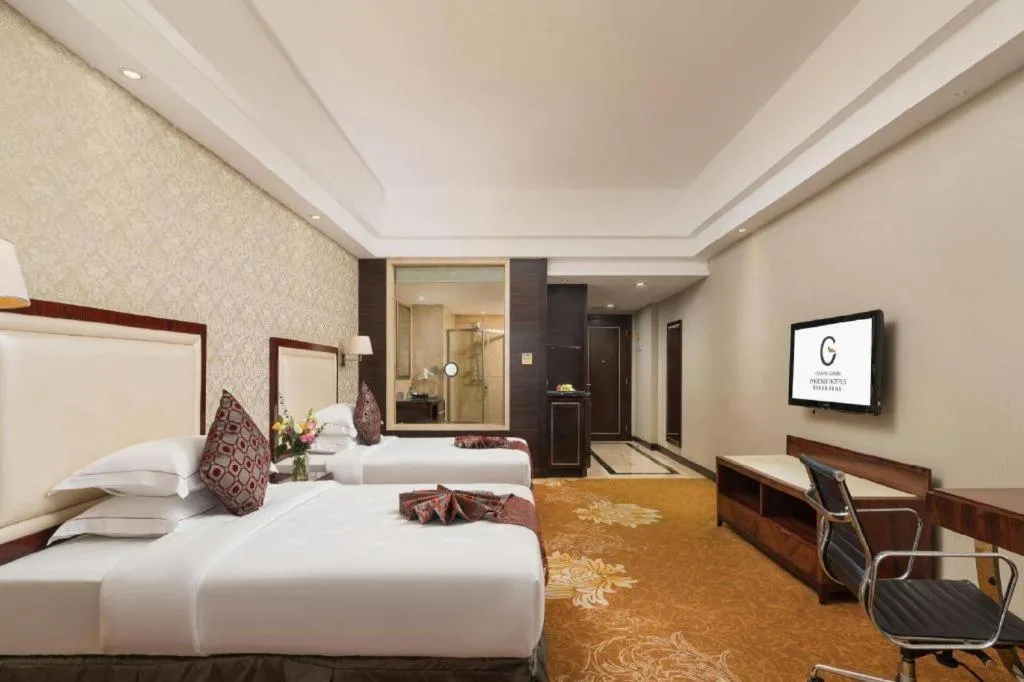 Bed in Country Garden Phoenix Hotel Maoming