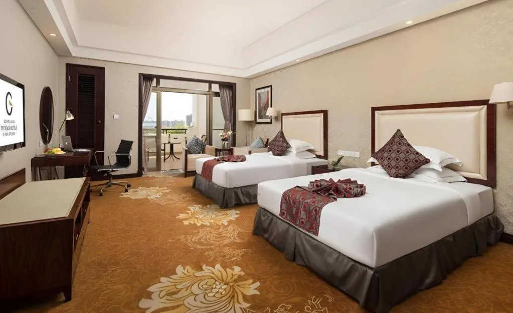 Bed in Country Garden Phoenix Hotel Maoming