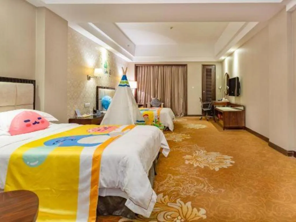 Bed in Country Garden Phoenix Hotel Maoming