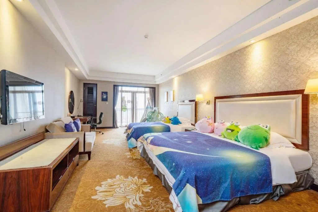 Bed in Country Garden Phoenix Hotel Maoming