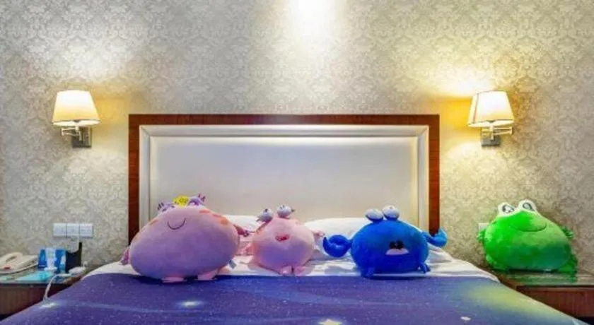 Bed in Country Garden Phoenix Hotel Maoming