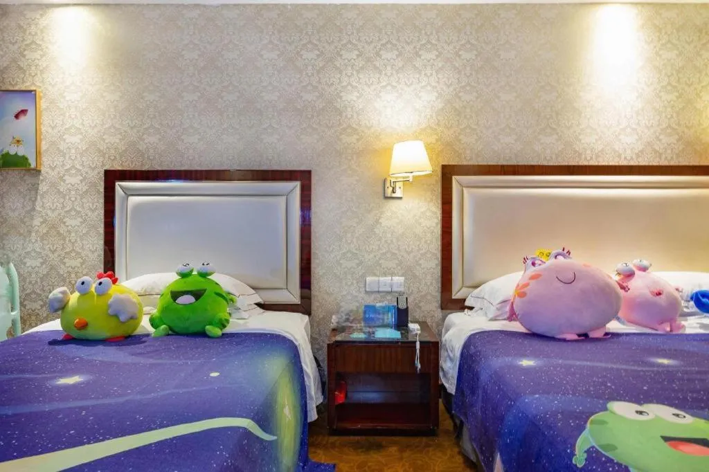 Bed in Country Garden Phoenix Hotel Maoming