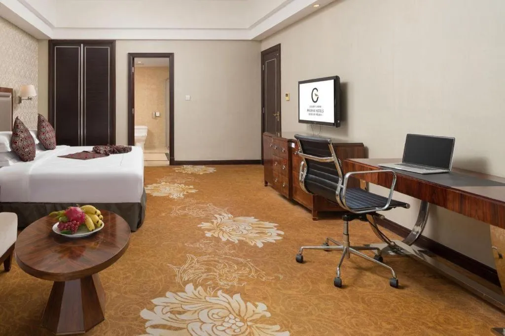 Bed in Country Garden Phoenix Hotel Maoming