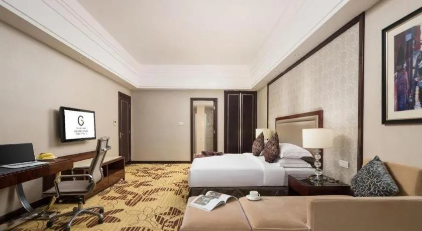 Bed in Country Garden Phoenix Hotel Maoming