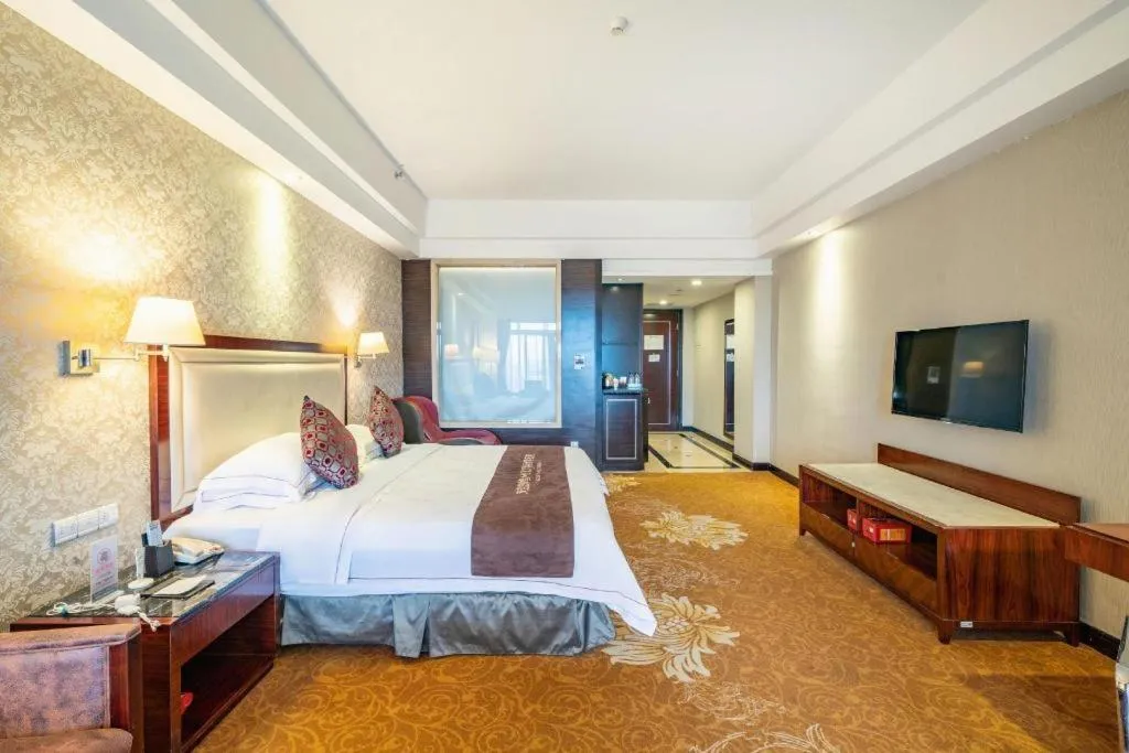 Bed in Country Garden Phoenix Hotel Maoming