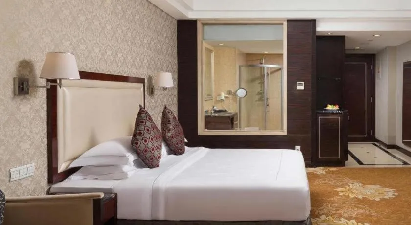 Bed in Country Garden Phoenix Hotel Maoming
