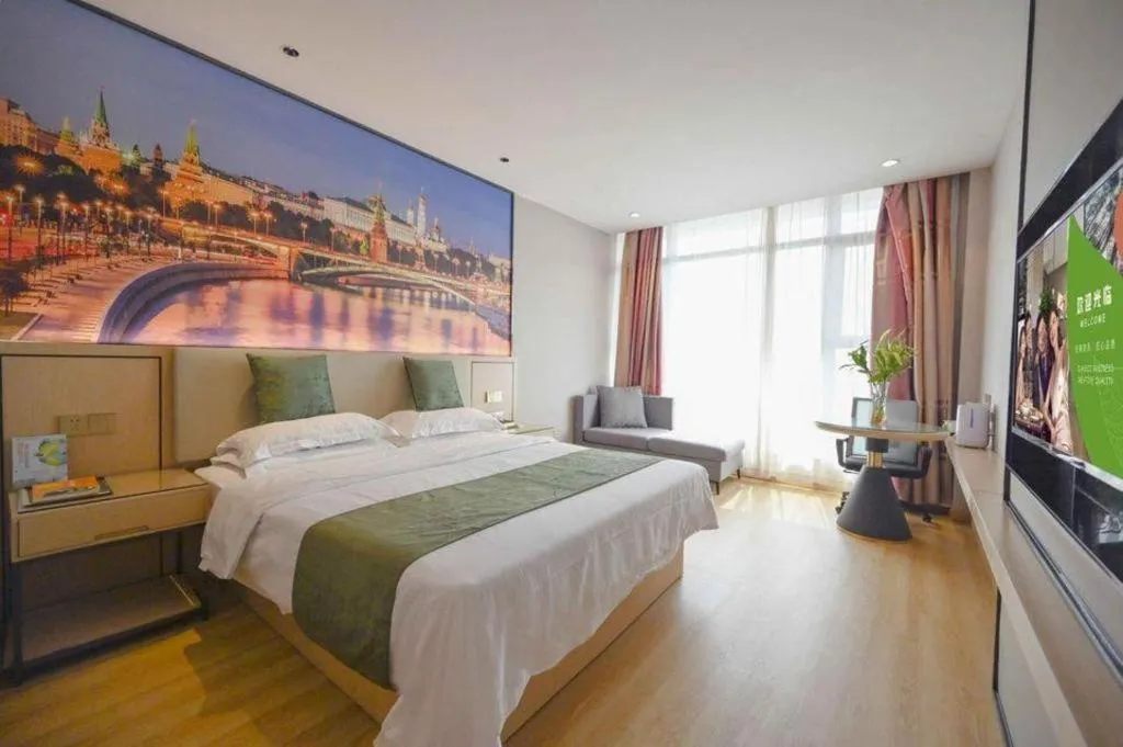 Bed in GreenTree Inn Jiangsu Zhangjiagang Jingang Town Darunfa Express Hotel