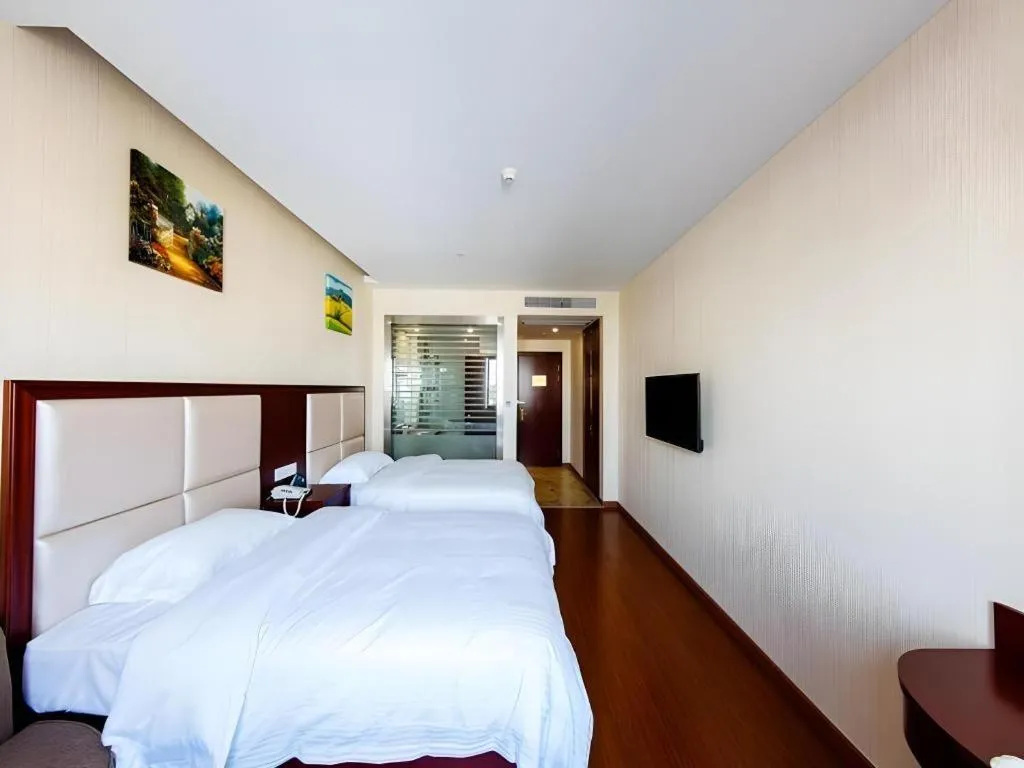 Bed in GreenTree Inn Jiangsu Zhangjiagang Jingang Town Darunfa Express Hotel