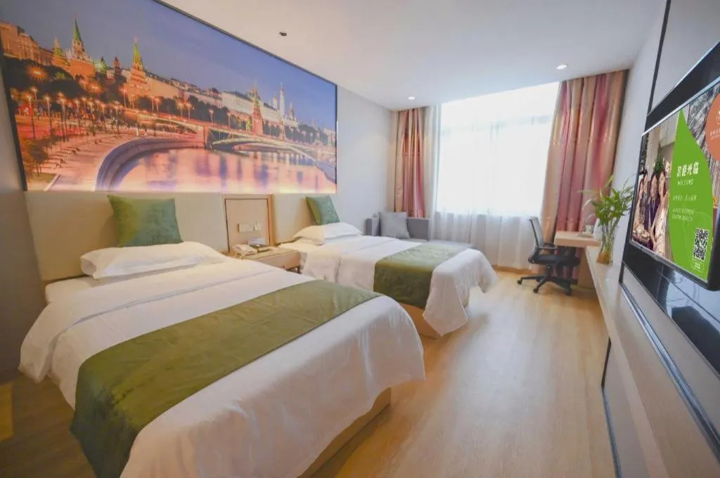Bed in GreenTree Inn Jiangsu Zhangjiagang Jingang Town Darunfa Express Hotel