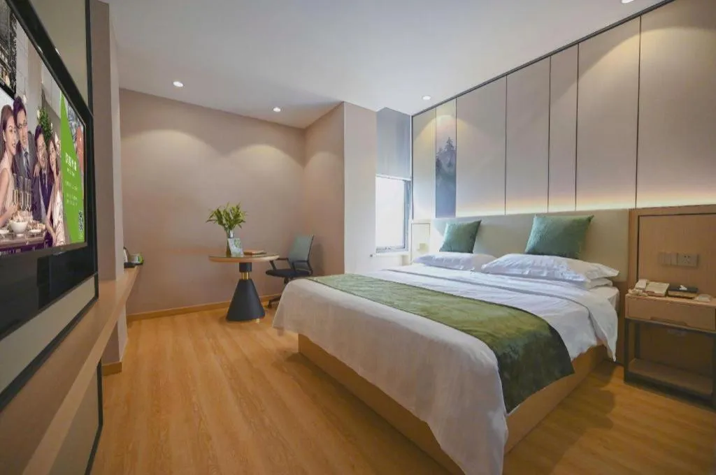 Bed in GreenTree Inn Jiangsu Zhangjiagang Jingang Town Darunfa Express Hotel