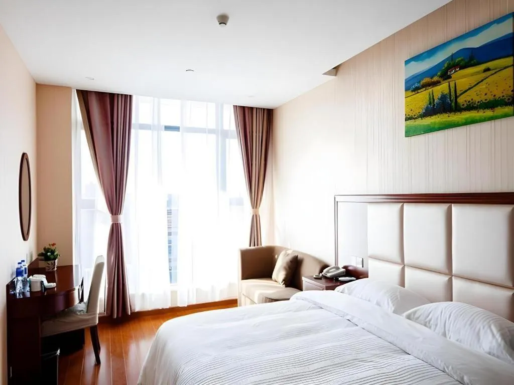 Bed in GreenTree Inn Jiangsu Zhangjiagang Jingang Town Darunfa Express Hotel