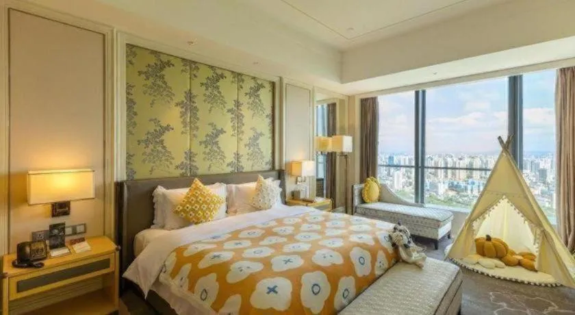 Bed in Ming Du Lakeside Hotel Nanning