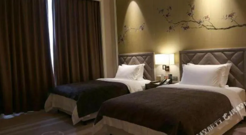 Bed in Ming Du Lakeside Hotel Nanning