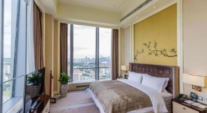 Bed in Ming Du Lakeside Hotel Nanning