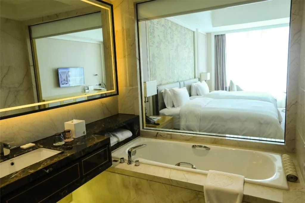 Bed in Ming Du Lakeside Hotel Nanning