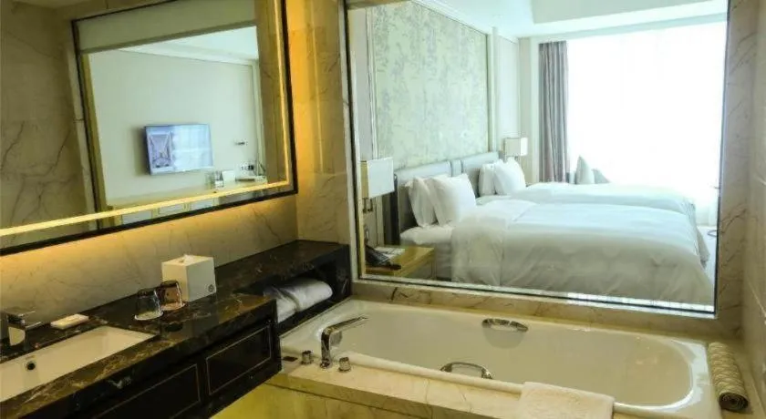 Bed in Ming Du Lakeside Hotel Nanning