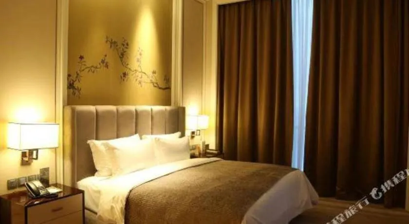 Bed in Ming Du Lakeside Hotel Nanning