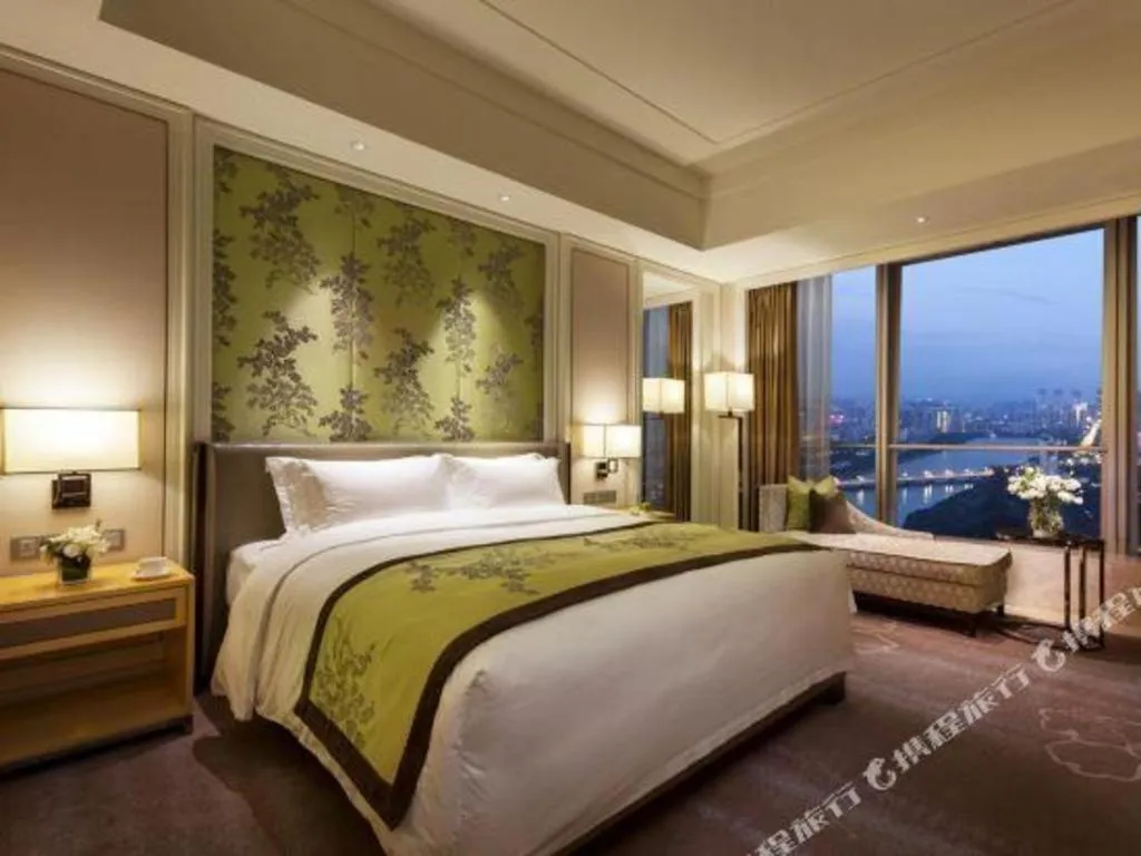 Bed in Ming Du Lakeside Hotel Nanning