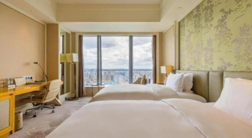 Bed in Ming Du Lakeside Hotel Nanning