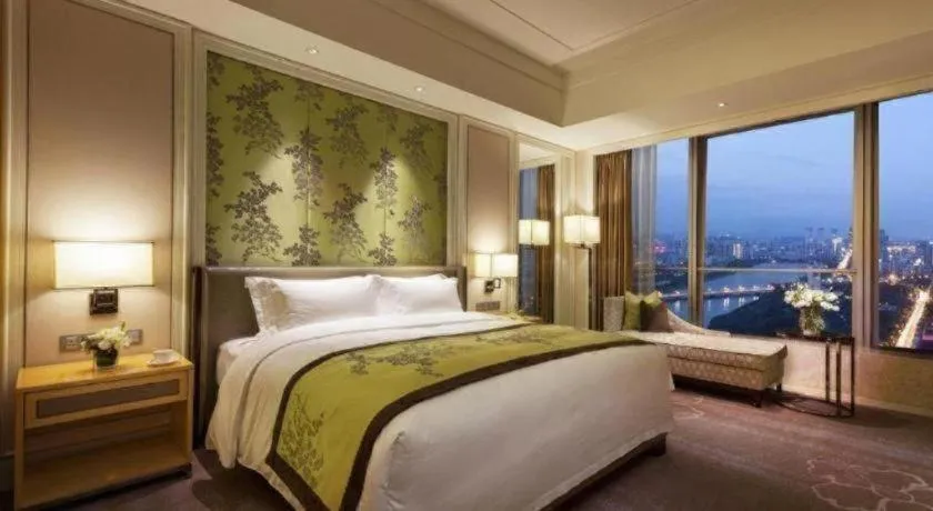 Bed in Ming Du Lakeside Hotel Nanning