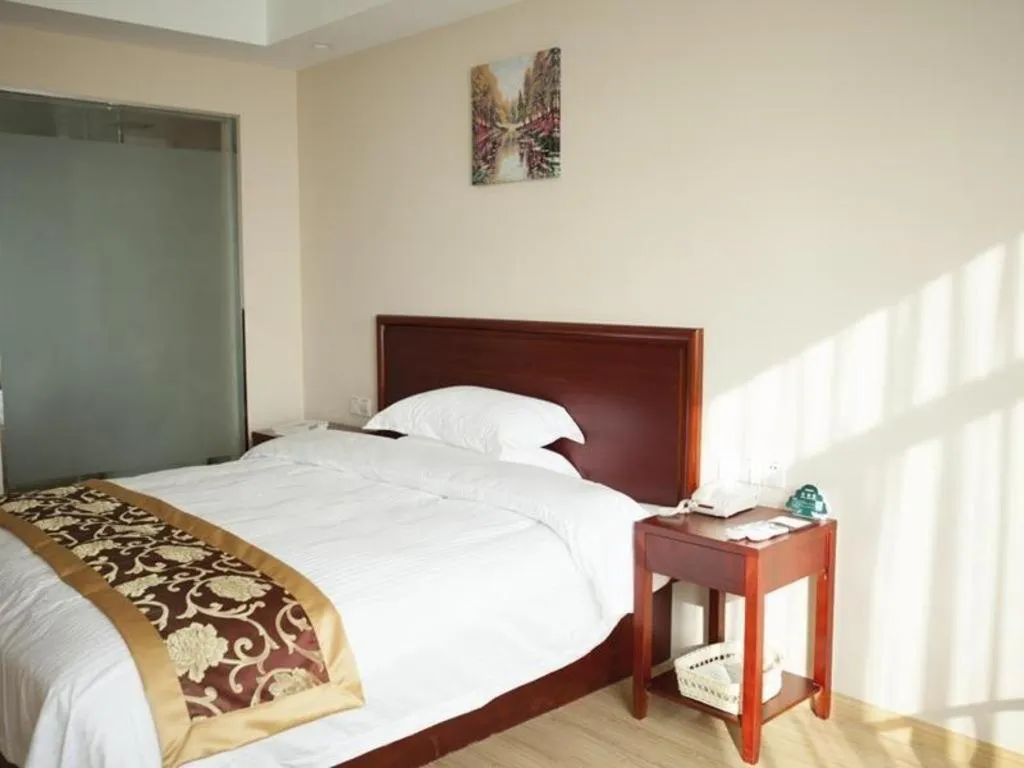 Bed in GreenTree Inn Jiansu Nantong Tongzhouwan Huanghe Road Business Hotel