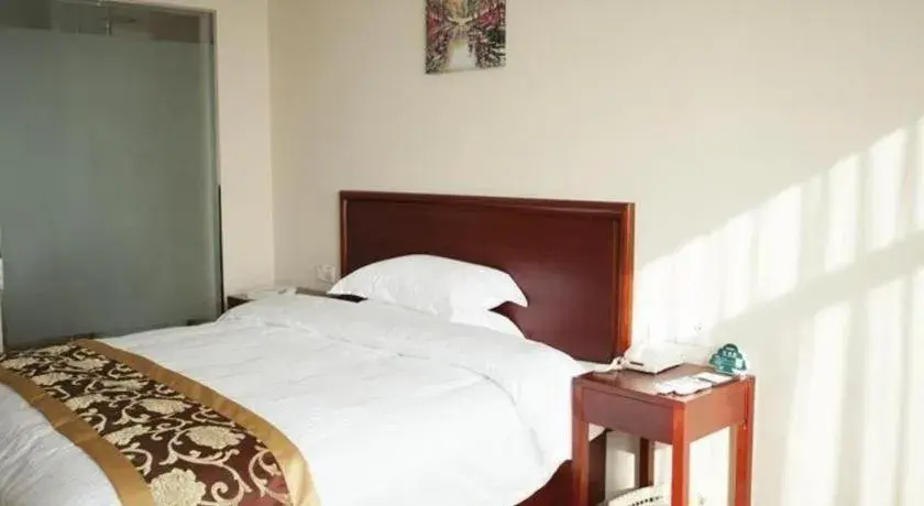Bed in GreenTree Inn Jiansu Nantong Tongzhouwan Huanghe Road Business Hotel Bed in GreenTree Inn Jiansu Nantong Tongzhouwan Huanghe Road Business Hotel