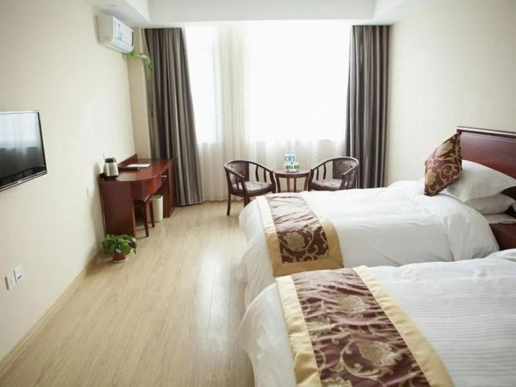 Bed in GreenTree Inn Jiansu Nantong Tongzhouwan Huanghe Road Business Hotel