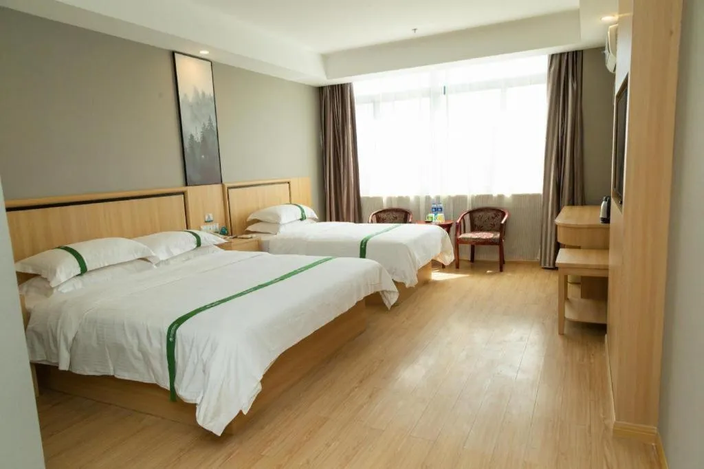 Bed in GreenTree Inn Jiansu Nantong Tongzhouwan Huanghe Road Business Hotel