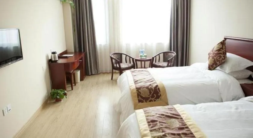 Bed in GreenTree Inn Jiansu Nantong Tongzhouwan Huanghe Road Business Hotel