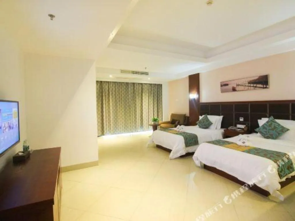 Bed in Qionghai Jin Mao Hotel