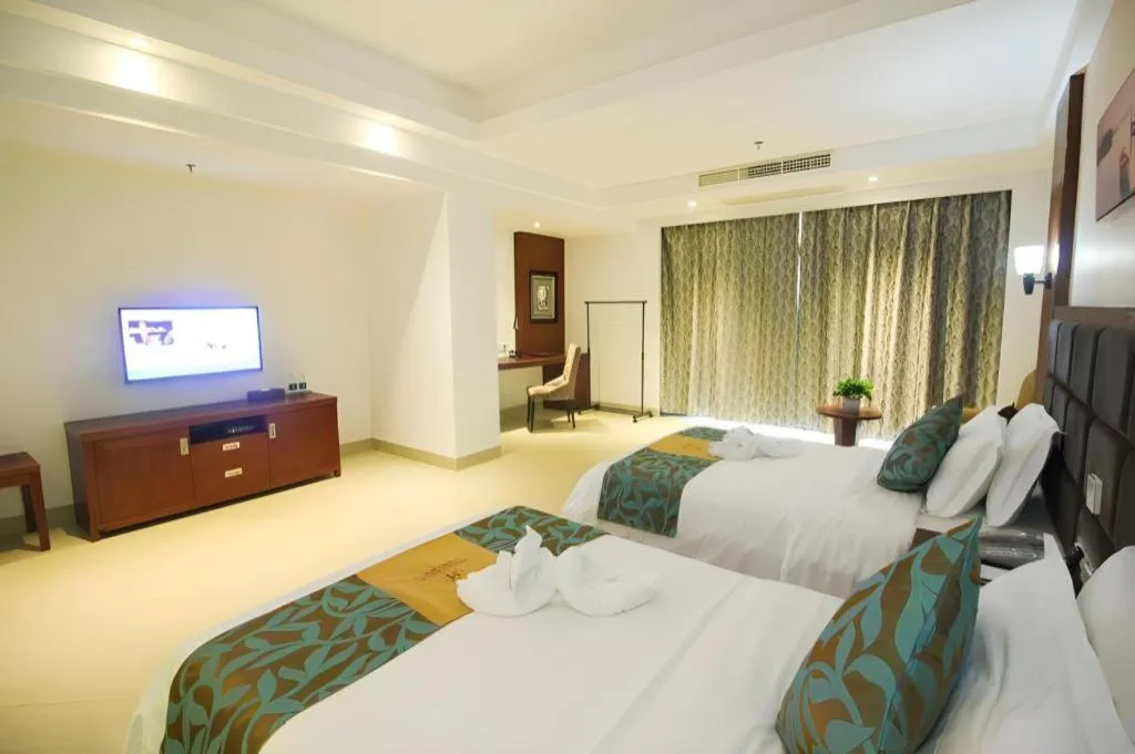 Bed in Qionghai Jin Mao Hotel