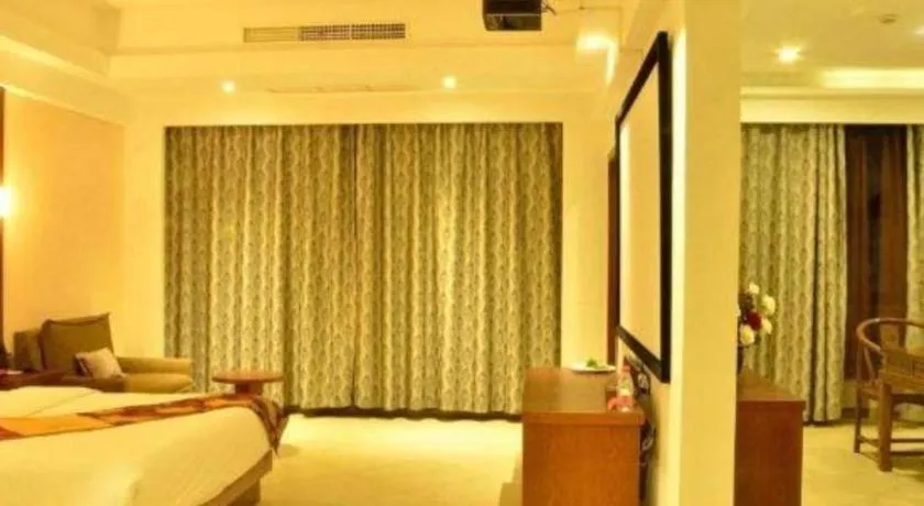 Bed in Qionghai Jin Mao Hotel