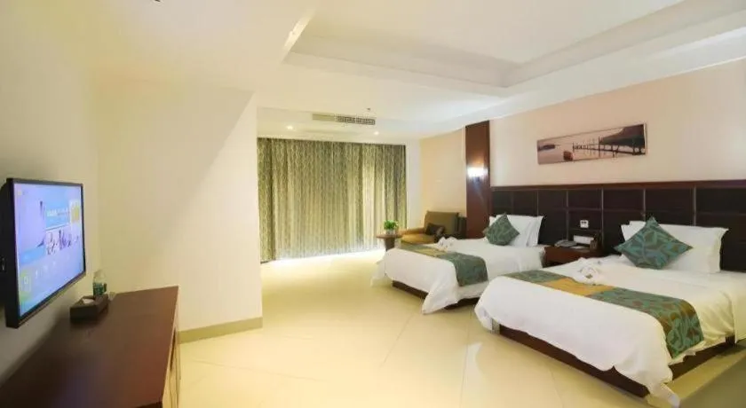 Bed in Qionghai Jin Mao Hotel