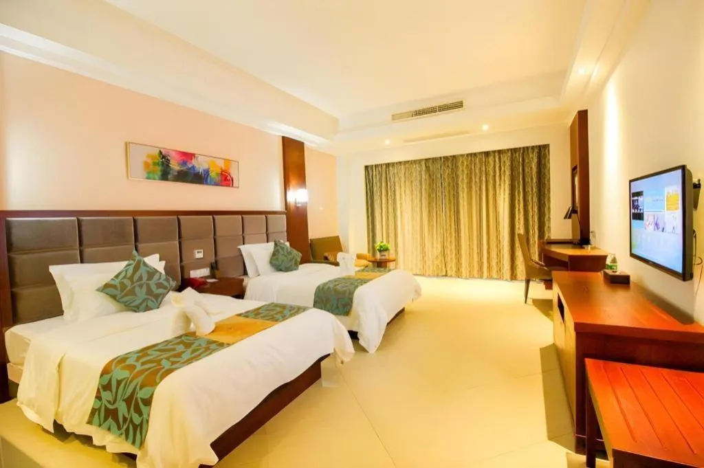 Bed in Qionghai Jin Mao Hotel