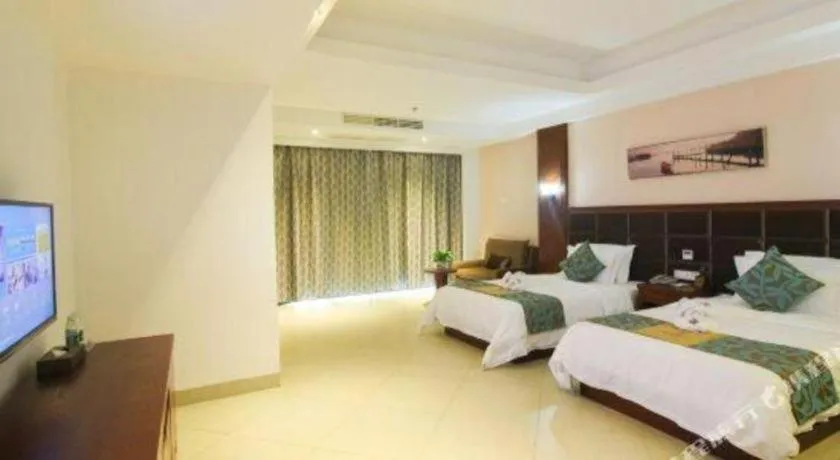 Bed in Qionghai Jin Mao Hotel