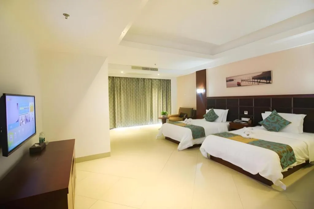 Bed in Qionghai Jin Mao Hotel