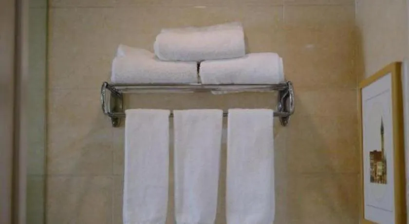 Bed in Vienna Hotel Tianjin Huaming