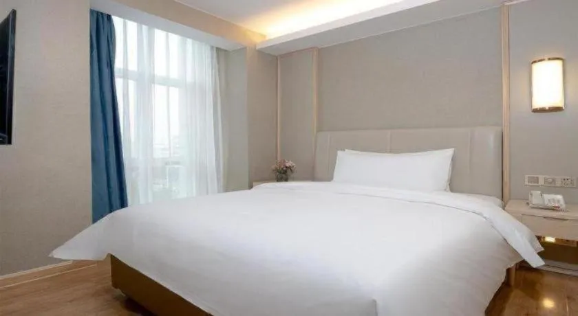 Bed in Vienna Hotel Tianjin Huaming