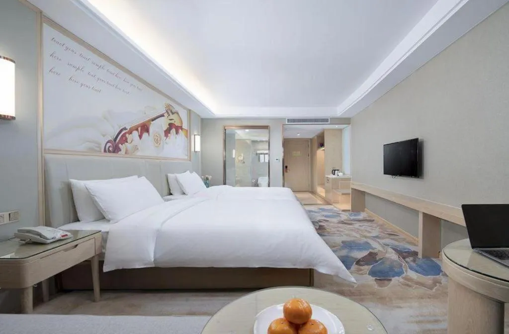 Bed in Vienna Hotel Tianjin Huaming